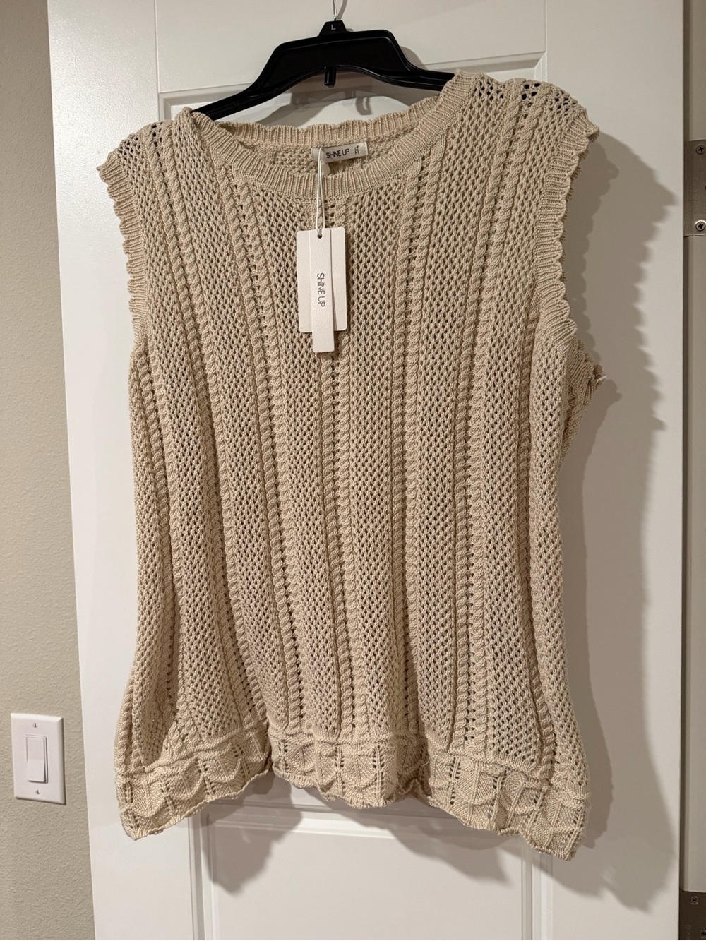 Shine up Cream Knit Sleeveless Tank with Decorative Hem